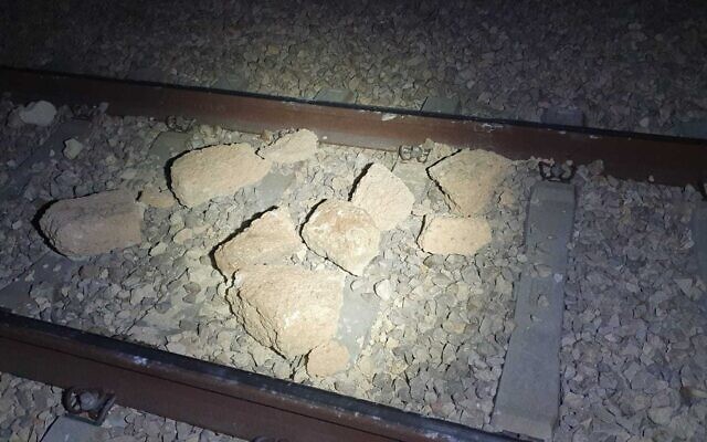 Stones placed on train tracks near Beersheba in January during mass Bedouin protests in the Negev. (Israel Police)