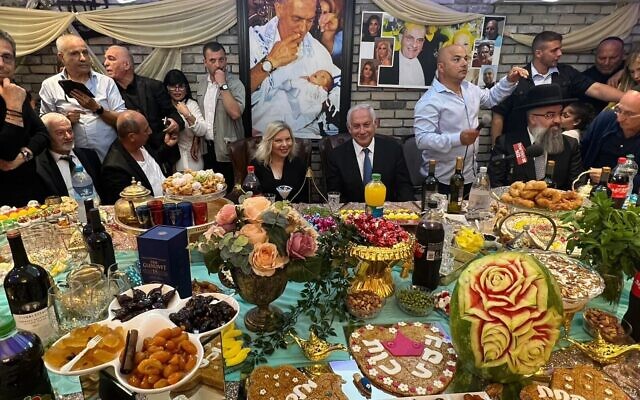 Former prime minister and currently opposition leader Benjamin Netanyahu attends a Mimouna celebration in Or Akiva, April 23, 2022. (Courtesy Likud Party)