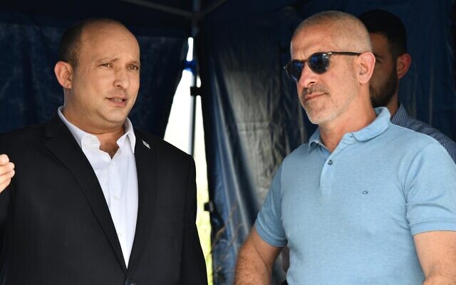 Prime Minister Naftali Bennett (L) and Shin Bet chief Ronen Bar are seen during a visit to the security service's regional command in the northern West Bank and the security barrier on April 3, 2022. (Haim Zach/GPO)