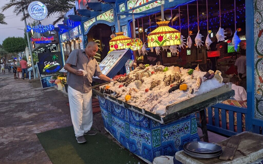 A fish restaurant in Dahab, Sinai prepares for the dinner rush on November 9, 2021. (Melanie Lidman/Times of Israel)