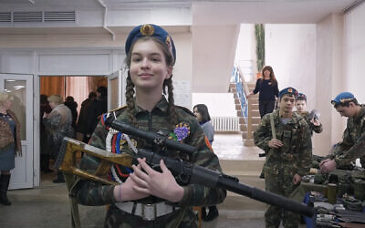 Teenage Masha in her Youth Army uniform. She is obsessed with WWII Russian history and patriotism in Dmitry Bogolyubov's documentary film, 'Town of Glory.' (Courtesy of First Hand Films)