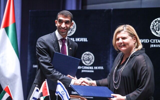 File: Then-economy minister Orna Barbivai (r) signs the Israel-UAE free trade agreement in Jerusalem with Thani bin Ahmed Al Zeyoudi, UAE Minister of State for Foreign Trade (Gideon Sharon/GPO)
