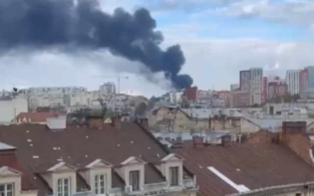 Smoke rising from a building in Lviv following Russian strikes in the western Ukrainian city, April 18, 2022. (Screen grab/Twitter)