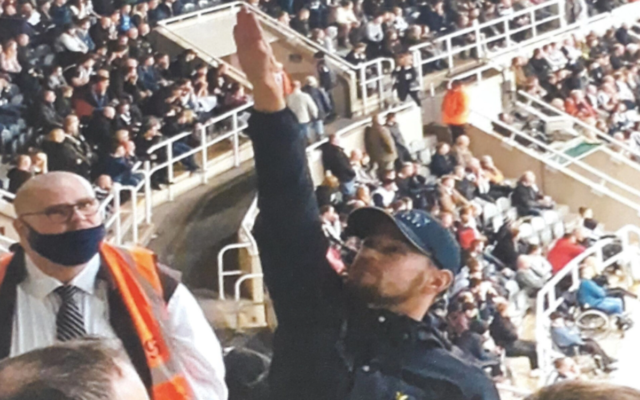Shay Asher gives a Nazi salute at a soccer match in Newcastle, England, October 2021. (Northumbria Police via JTA)