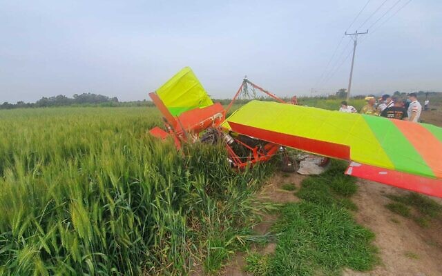 Firefighters at the scene of a light plane crash in the Emek Hefer region of central Israel on April 2, 2022. (Fire and Rescue Services) Firefighters at the scene of a light plane crash in the Emek Hefer region of central Israel on April 2, 2022. (Fire and Rescue Services)