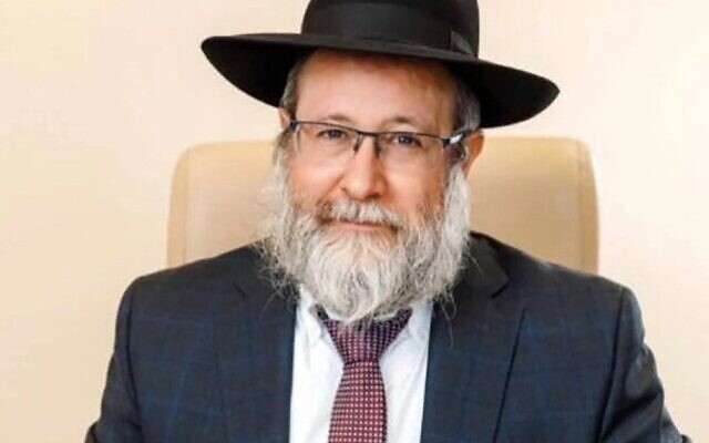 Rabbi Liron Ederi sits at his desk in Kryvyi Rih, Ukraine, in 2016. (Chabad.org via JTA)