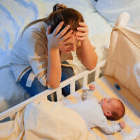 Illustrative image of a mother with postnatal depression (iStock by Getty Images)