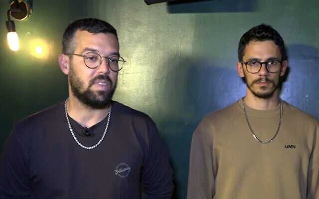 Dean Reichel (L) and Gal Cohen, two of the owners of the Simta and Ilka bars in Tel Aviv, April 8, 2022 (Screen grab/Channel 12 news)