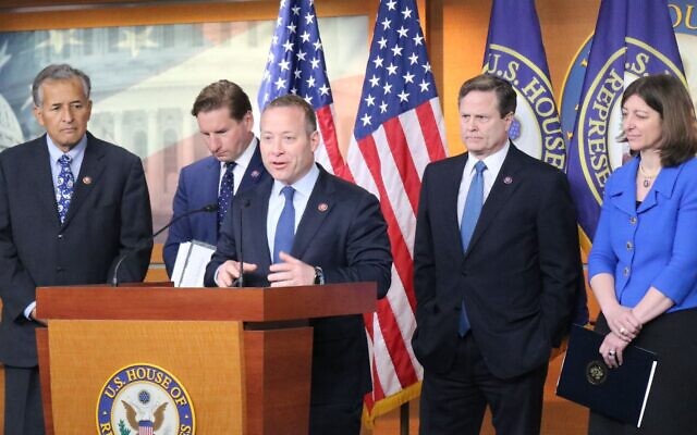 (L-R) Reps. Juan Vargas, Dean Phillips, Josh Gottheimer, Donald Norcross and Elaine Luria speak at a press conference on Capitol Hill on April 6, 2022. (Courtesy)