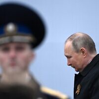 Russian President Vladimir Putin arrives to watch the Victory Day military parade at Red Square in central Moscow on May 9, 2022. (Kirill KUDRYAVTSEV / AFP)