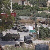 Israeli soldiers are seen operating in the West Bank city of Jenin on May 13, 2022. (Jaafar Ashtiyeh/AFP)
