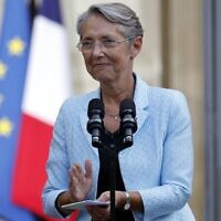 France's newly appointed Prime Minister Elisabeth Borne delivers a speech during a handover ceremony in the courtyard of the Hotel Matignon, French prime ministers' official residence, in Paris on May 16, 2022. (Ludovic MARIN/POOL/AFP)