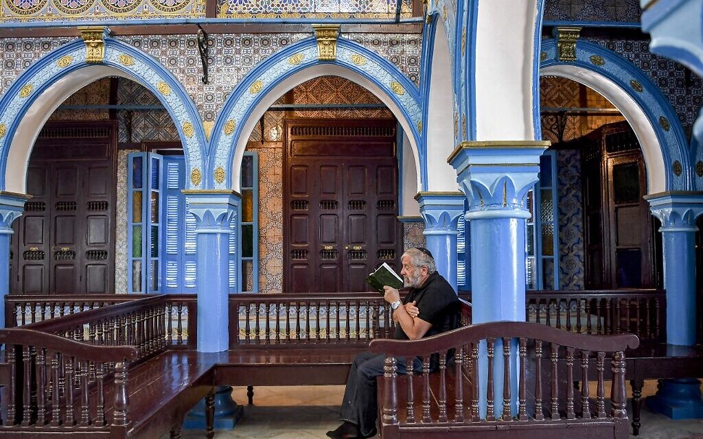 A Jewish pilgrim at the Ghriba synagogue in Tunisia's southern resort island of Djerba on May 18, 2022, during the annual Jewish pilgrimage to the synagogue. (FETHI BELAID / AFP)