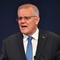 Australia's Prime Minister Scott Morrison concedes defeat in the national elections in Sydney on May 21, 2022. (Saeed KHAN / AFP)