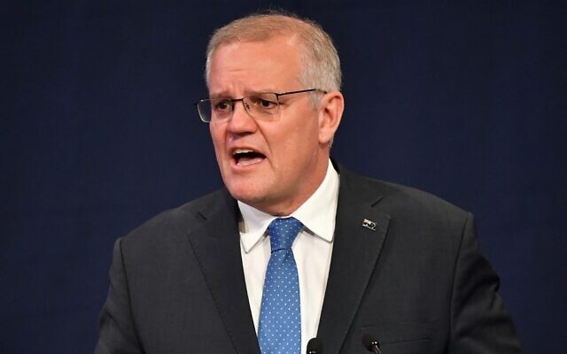 Australia's Prime Minister Scott Morrison concedes defeat in the national elections in Sydney on May 21, 2022. (Saeed KHAN / AFP)