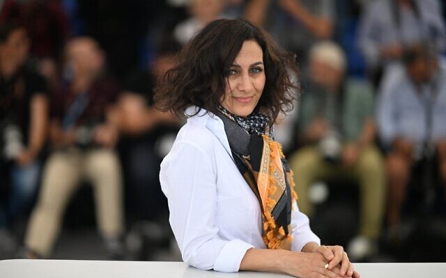 Arab-Israeli director Maha Haj poses during a photocall for the film "Mediterranean Fever" at the 75th Cannes Film Festival in Cannes, southern France, on May 25, 2022. (PATRICIA DE MELO MOREIRA / AFP)