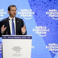 President Isaac Herzog addresses the assembly during the World Economic Forum annual meeting in Davos, on May 25, 2022. (Fabrice Coffrini/AFP)