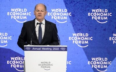 German Chancellor Olaf Scholz addresses the World Economic Forum in Davos, Switzerland, on May 26, 2022. (Fabrice Coffrini/AFP)