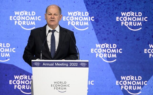 German Chancellor Olaf Scholz addresses the World Economic Forum in Davos, Switzerland, on May 26, 2022. (Fabrice Coffrini/AFP)