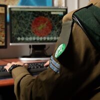 Illustrative: A soldier from the IDF's Military Intelligence Directorate works at a computer. (Israel Defense Forces)