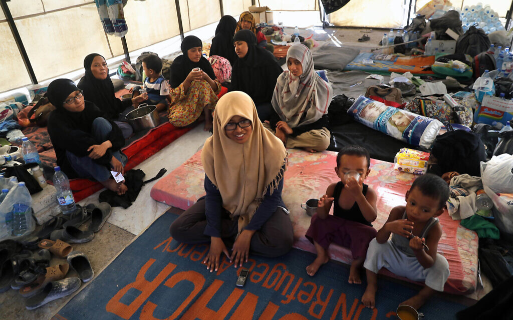 Illustrative: In this file picture taken on July 24, 2017, an Indonesian family who escaped from the Islamic State group in Raqqa gather inside their tent at a refugee camp, in Ain Issa, Syria. The family spent nearly two years with the Islamic State in Syria and has denounced IS militants as interested only in power, money and sex in a video released by Indonesia's counterterrorism agency. (AP Photo/Hussein Malla, File)