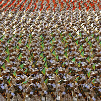 File: In this Sept. 22, 2014 photo, members of the Iran's Revolutionary Guard march during an annual military parade at the mausoleum of Ayatollah Khomeini, outside Tehran, Iran (AP Photo/Ebrahim Noroozi, File)