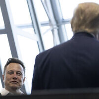 Tesla and SpaceX Chief Executive Officer Elon Musk talks with then US president Donald Trump after viewing the SpaceX flight to the International Space Station, at Kennedy Space Center,  on May 30, 2020, in Cape Canaveral, Florida. (AP Photo/Alex Brandon)