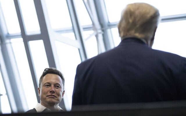 Tesla and SpaceX Chief Executive Officer Elon Musk talks with then US president Donald Trump after viewing the SpaceX flight to the International Space Station, at Kennedy Space Center,  on May 30, 2020, in Cape Canaveral, Florida. (AP Photo/Alex Brandon)