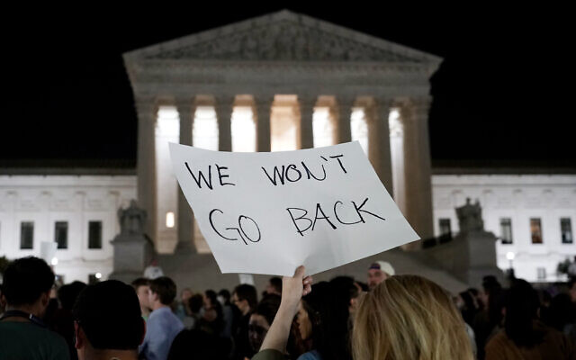 A crowd of people gather outside the Supreme Court, May 2, 2022 in Washington (AP Photo/Alex Brandon)