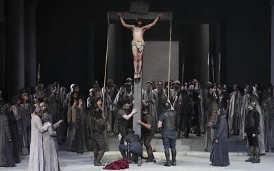 Rochus Rueckel as Jesus and cast members perform during the rehearsal of the 42nd Passion Play in Oberammergau, Germany, May 4, 2022. (AP Photo/Matthias Schrader)