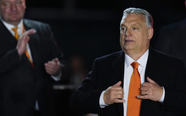Hungary's Prime Minister Viktor Orban acknowledges cheering supporters during an election night rally in Budapest, Hungary, on April 3, 2022. (Petr David Josek/AP)