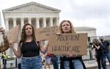 Abortion rights demonstrators rally, Saturday, May 14, 2022, outside the Supreme Court in Washington, during protests across the country. (AP Photo/Jacquelyn Martin)