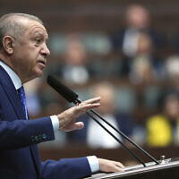 Turkish President Recep Tayyip Erdogan addresses his ruling party legislators, in Ankara, Turkey, May 18, 2022. (Turkish Presidency via AP Photo)