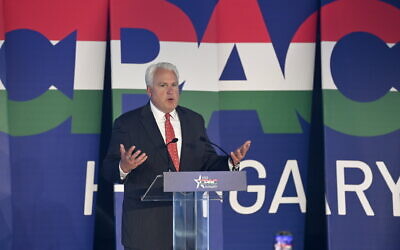 The chairman of the Conservative Political Action Coalition (CPAC), Matt Schlapp, delivers the welcome speech at the CPAC conference in Budapest, Hungary, May 19, 2022. (Szilard Koszticsak/MTI via AP)