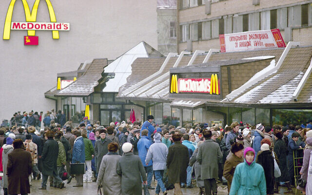 Hundreds of Soviets and almost as many correspondents crowded around the first McDonald's in the Soviet Union on its opening day in Moscow on January 31, 1990. (AP Photo/Rudi Blaha, File)