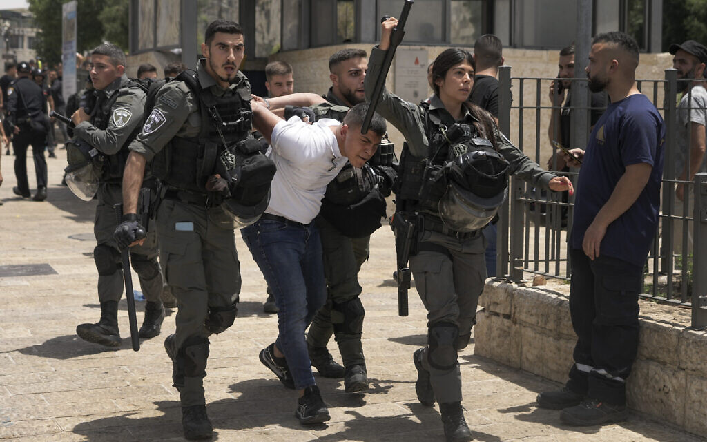 Security forces detain a Palestinian protester near the Damascus Gate to the Old City  Jerusalem as Israelis mark Jerusalem Day, May 29, 2022. (Mahmoud Illean/AP)