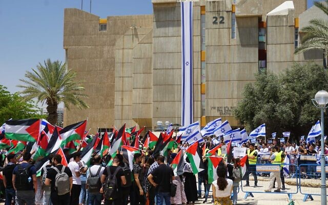 Israeli and Palestinian students stage protests at Ben Gurion University in Beersheba on May 23, 2022. (Emanuel Fabian/Times of Israel)