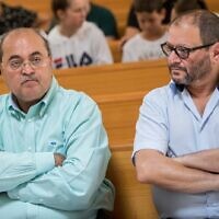 Joint List party members Ahmad Tibi, left, and Ofer Cassif during a court hearing at the Supreme Court in Jerusalem August 22, 2019. (Yonatan Sindel/Flash90)