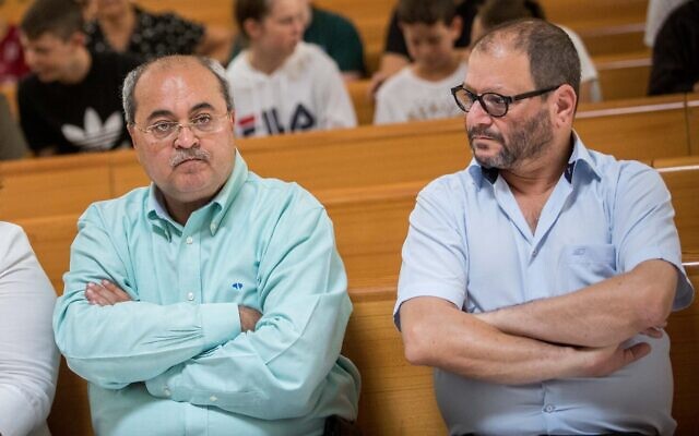 Joint List party members Ahmad Tibi, left, and Ofer Cassif during a court hearing at the Supreme Court in Jerusalem August 22, 2019. (Yonatan Sindel/Flash90)