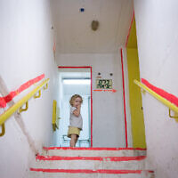 Illustrative: A young girl inside a bomb shelter in Tel Aviv. (Miriam Alster/FLASH90)