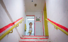 Illustrative: A young girl inside a bomb shelter in Tel Aviv. (Miriam Alster/FLASH90)