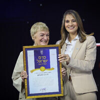 Israel Prize winner Prof. Ruth Berman, left, with Education Minister Yifat Shasha-Biton at the award ceremony in Jerusalem, on Israel's Independence Day, on May 5, 2022. (Noam Revkin Fenton/Flash90)