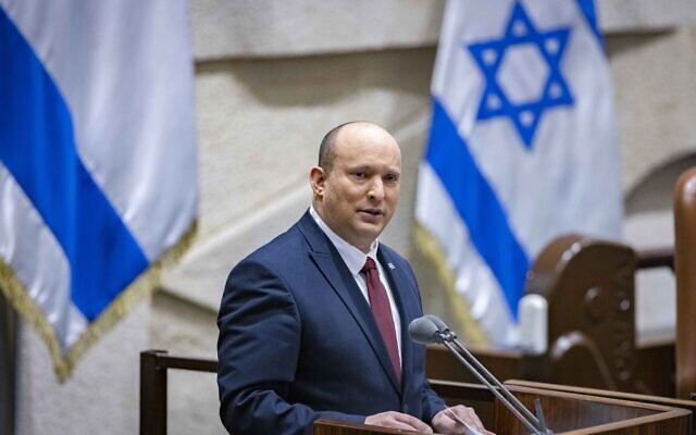 Prime Minister Naftali Bennett speaks to the Knesset plenum in Jerusalem on May 11, 2022. (Olivier Fitoussi/Flash90)