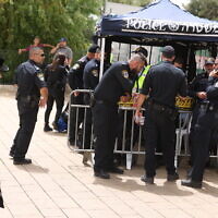 Police officers guard ahead of the Lag B'omer festival, at the Tomb of Rabbi Shimon bar Yochai, in Meron, northern Israel on May 15, 2022. (David Cohen/Flash90)