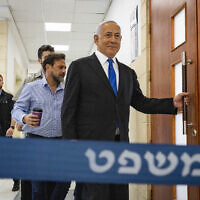 File: Then-former prime minister Benjamin Netanyahu arrives for a hearing in his trial, at the District Court in Jerusalem on May 17, 2022. (Olivier Fitoussi/Flash90)