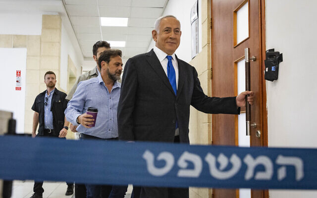 File: Then-former prime minister MK Benjamin Netanyahu arrives for a hearing in his trial, at the District Court in Jerusalem on May 17, 2022. (Olivier Fitoussi/Flash90)