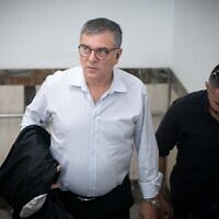 Shlomo Filber, former director-general of the Communications Ministry, arrives at the Jerusalem District Court for a hearing former prime minister Benjamin Netanyahu's corruption trial, May 25, 2022. (Arie Leib Abrams/Flash90)