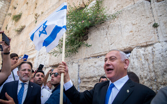 Head of the Likud party Benjamin Netanyahu at the Western Wall in Jerusalem's Old City, on Jerusalem Day, May 29, 2022. (Arie Leib Abrams/Flash90)