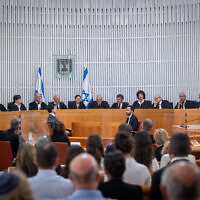 Supreme Court Chief Justice Ester Hayut with outgoing Supreme Court judge George Karra and Supreme court justices at a ceremony held for Karra, at the Supreme Court in Jerusalem on May 29, 2022. (Yonatan Sindel/Flash90)