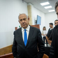 Former prime minister Benjamin Netanyahu arrives for a court hearing in his trial, at the District Court in Jerusalem on May 31, 2022. (Yonatan Sindel/Flash90)